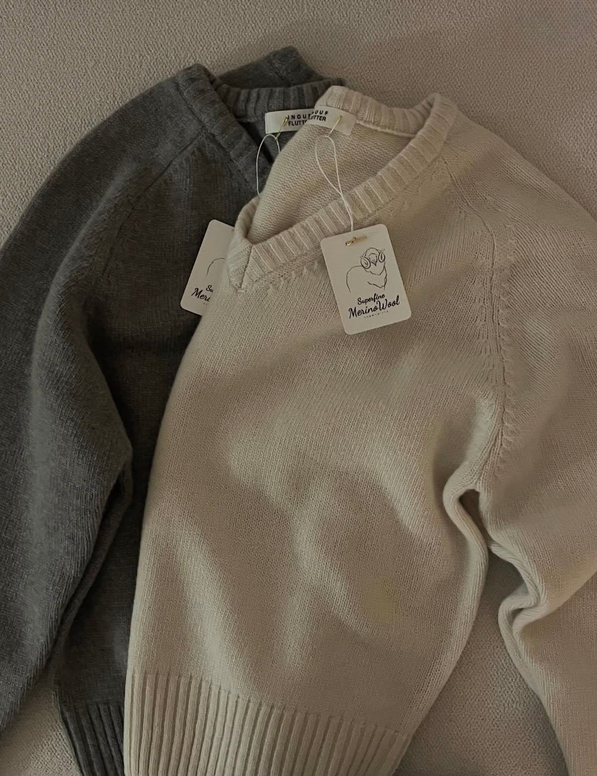 100% MERINO WOOL V-NECKLINE SWEATER