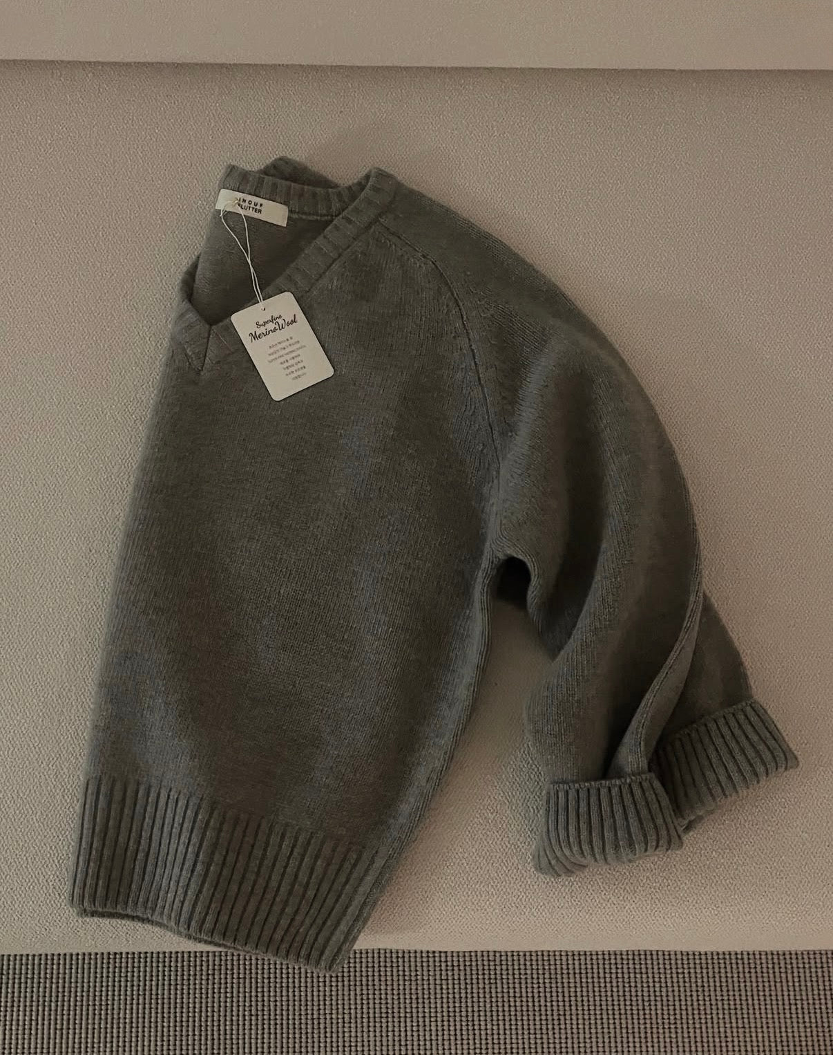 100% MERINO WOOL V-NECKLINE SWEATER